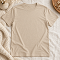 Blank sand-colored Gildan Softstyle tee on an ivory boutique background