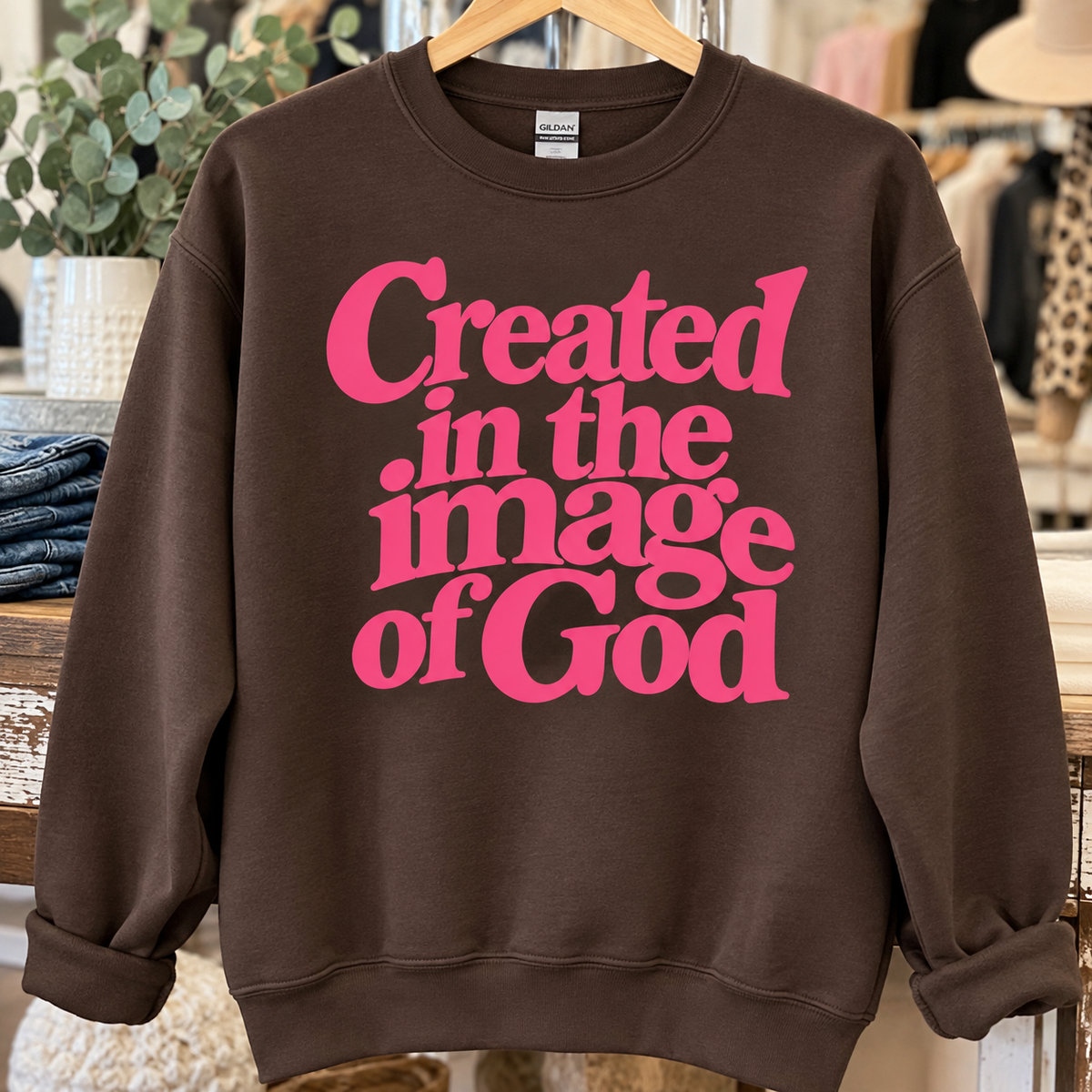 Dark Chocolate sweatshirt with medium blue Created in the Image of God design