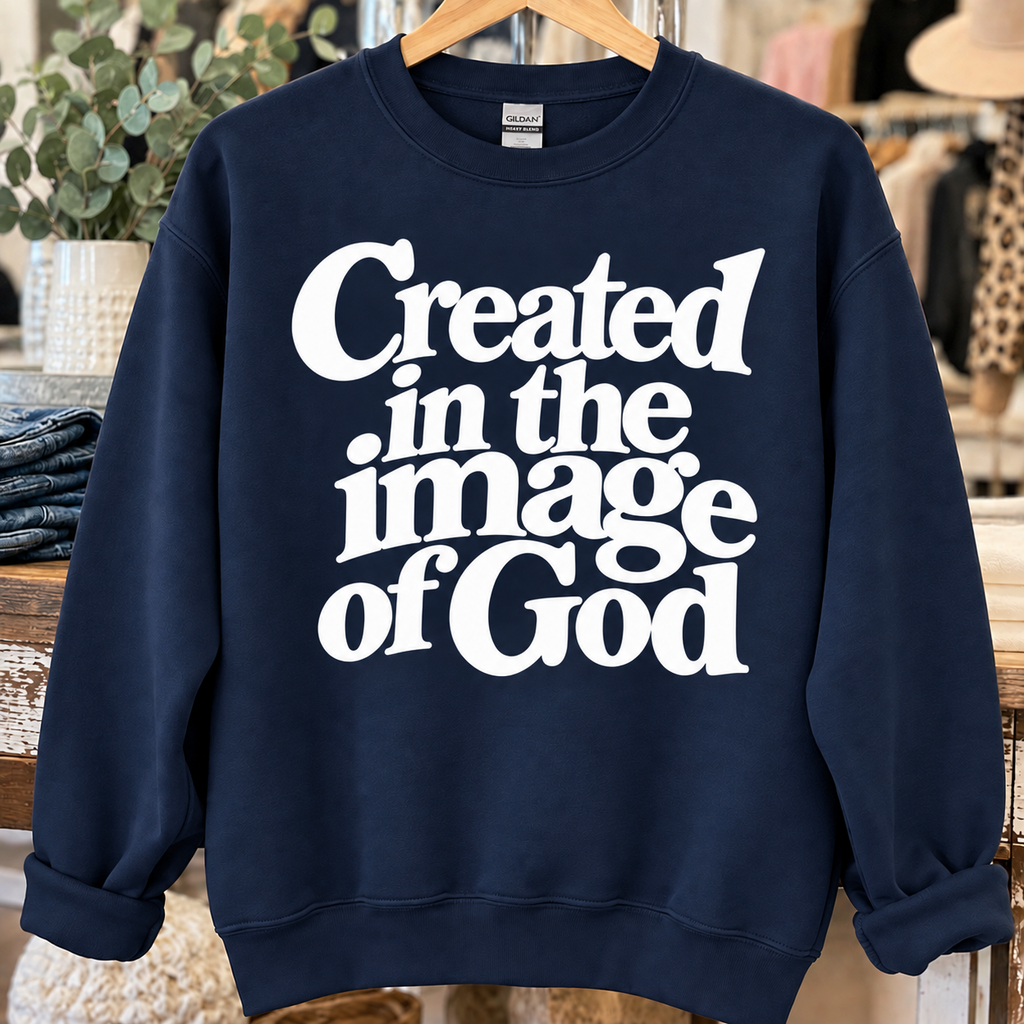 Navy sweatshirt with white Created in the Image of God design