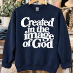 Navy sweatshirt with white Created in the Image of God design
