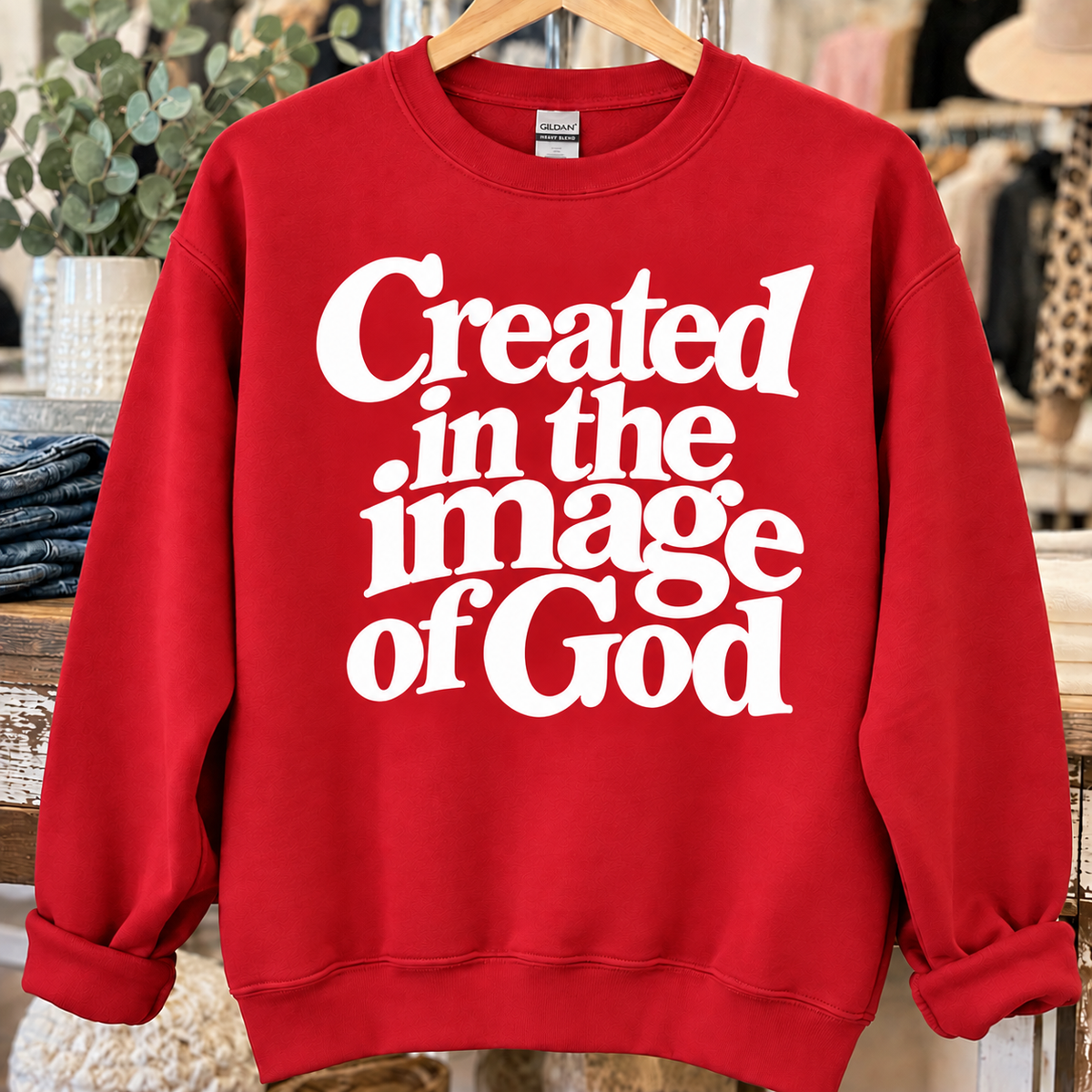 Red sweatshirt with white Created in the Image of God design