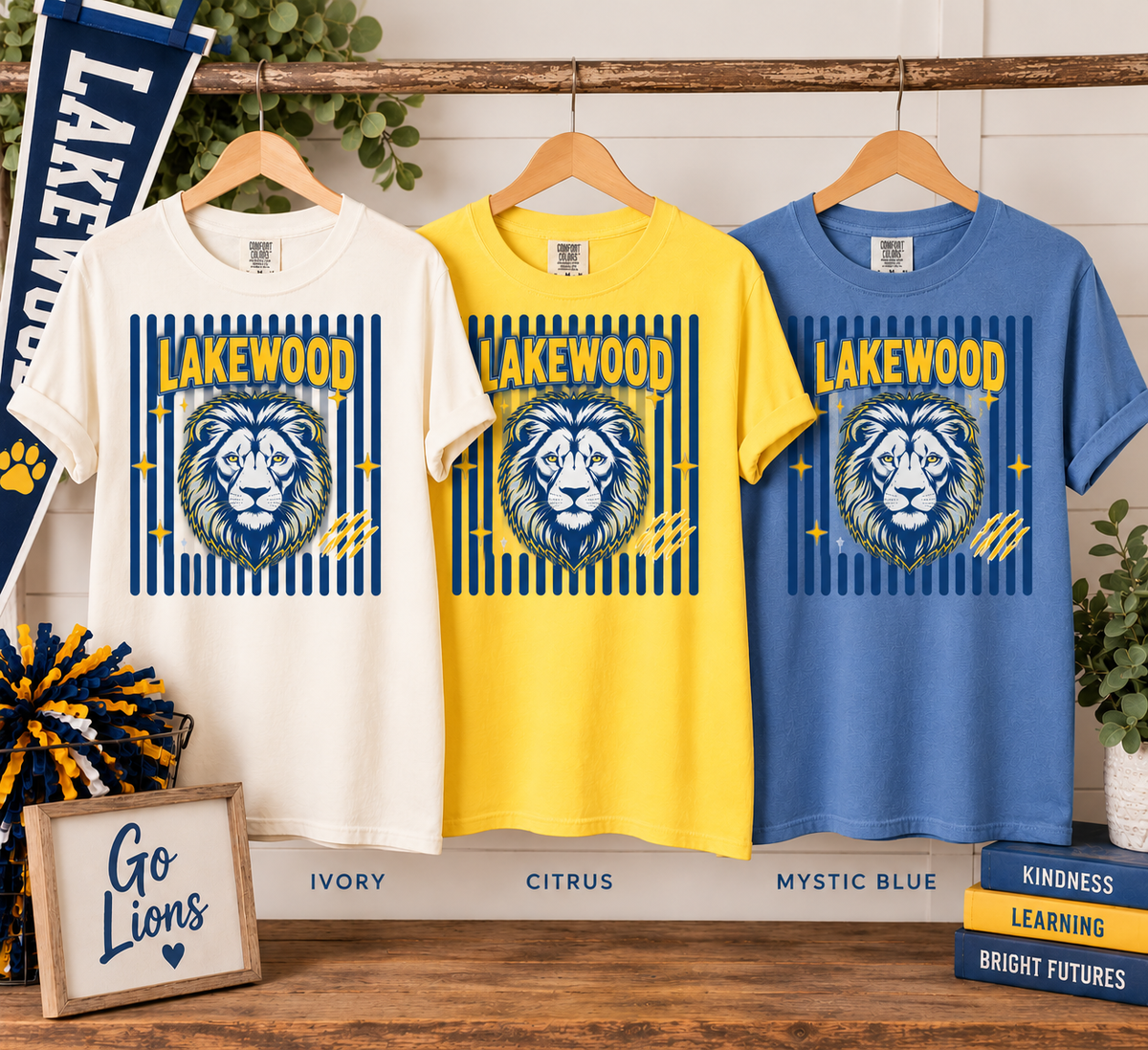 Lakewood striped lion Comfort Colors tees in White, Citrus, and Mystic Blue