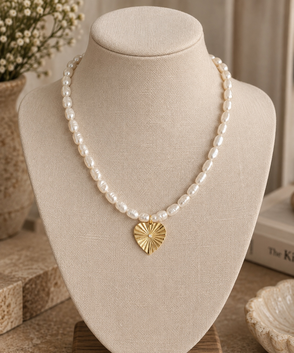 Pearl Heart Necklace with ivory pearl-style beads and a textured gold-tone heart pendant